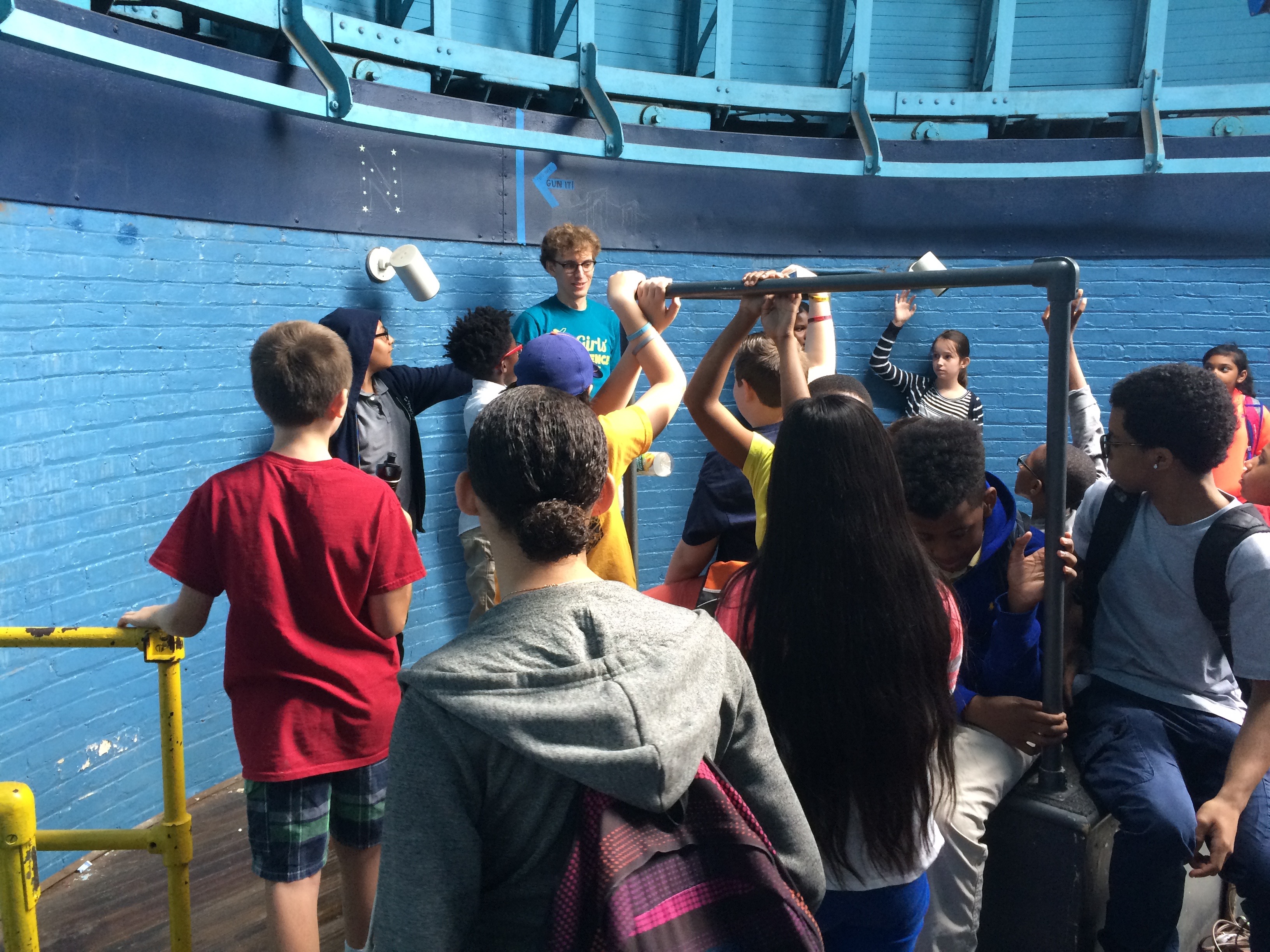 Students explore the observatory as part of a lab tour